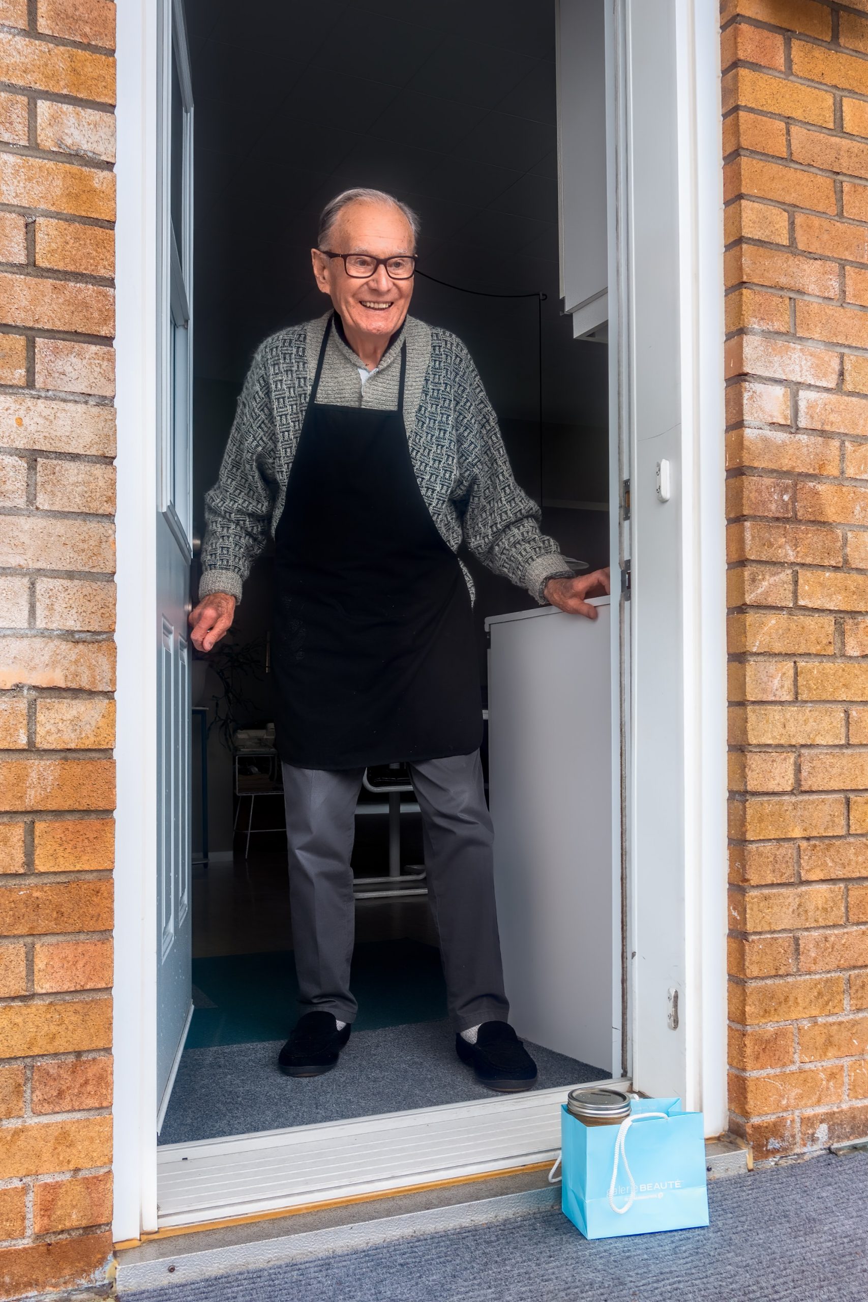 A 90 year old man receives a soup delivery. Photo by Andre Ouellett on Unsplash.com