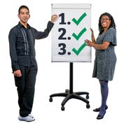 Man and women with numbers on a board ticked off.jpg